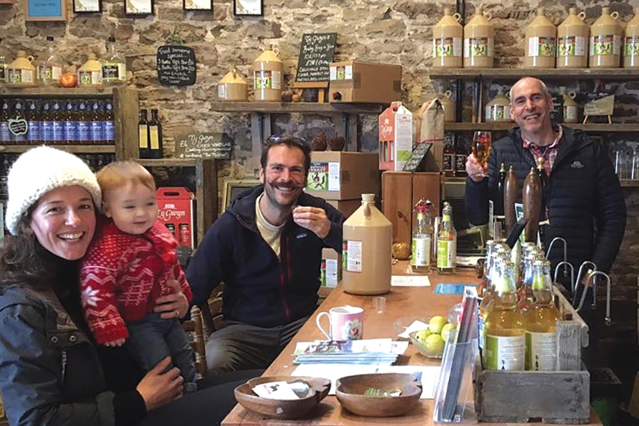 People drinking cider at the Ty Gwyn Cider shop and bar